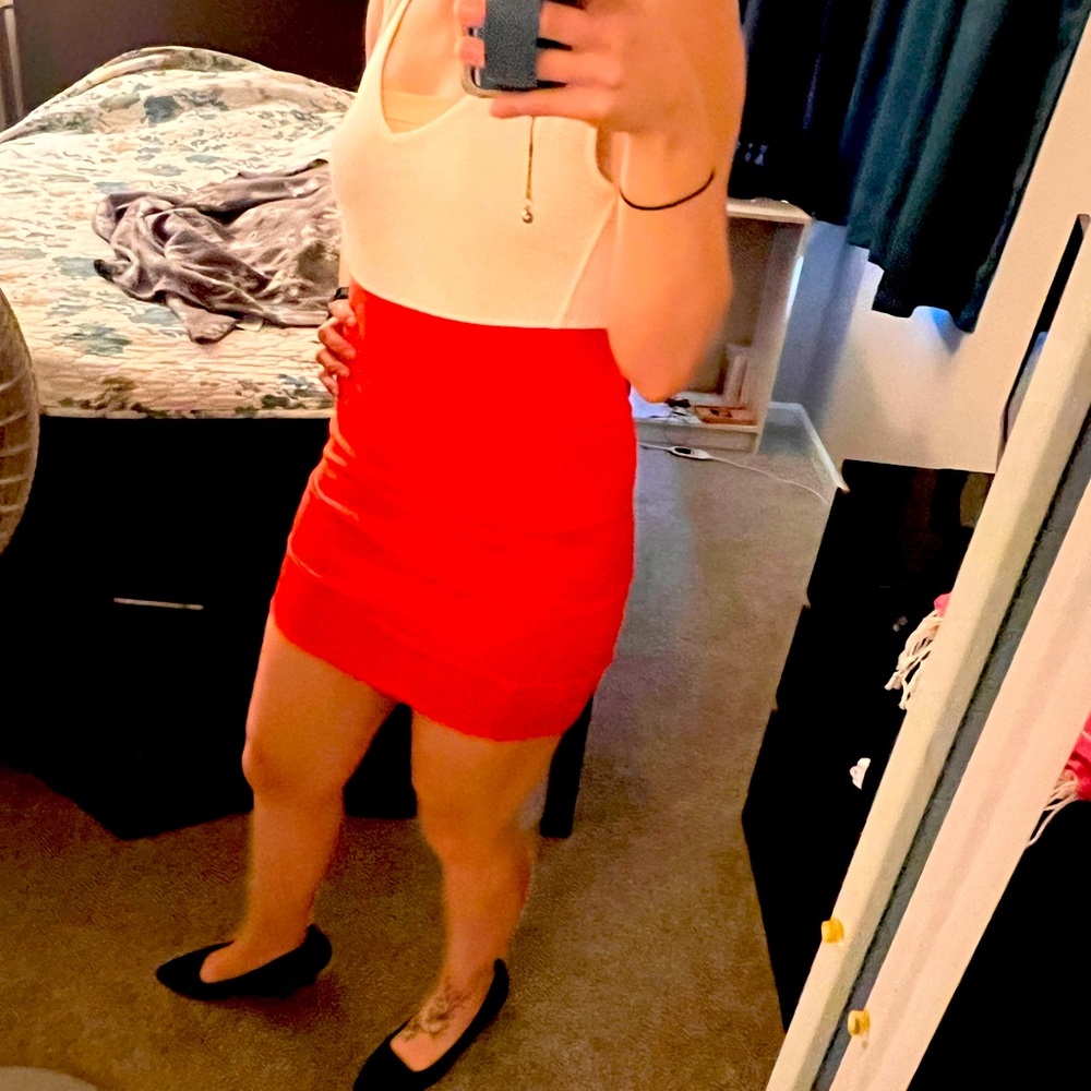 Orange and white dress, tight not sure what brand